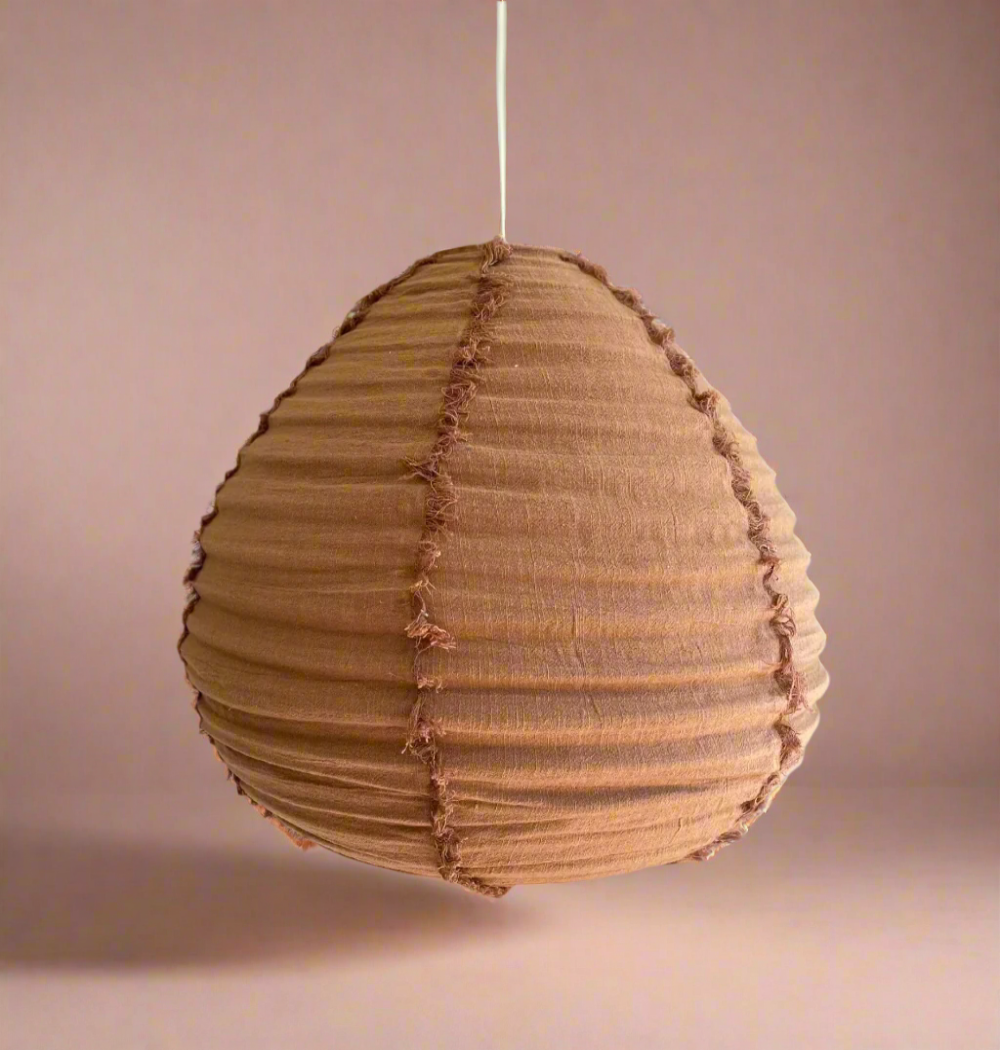 Handmade 100% linen light pendant shade, with fringe detail and bamboo frame.