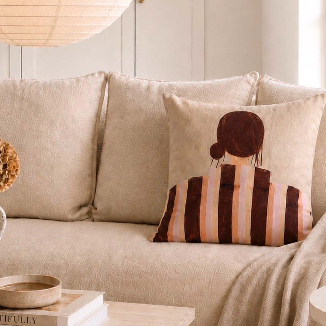Little Nordic Sol Sadie cushion back view with striped artwork styled on a neutral linen sofa