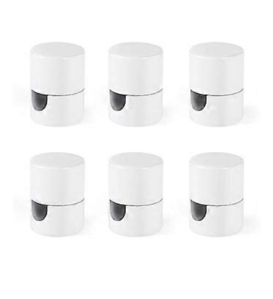White ceiling hooks to hang linen light shades.