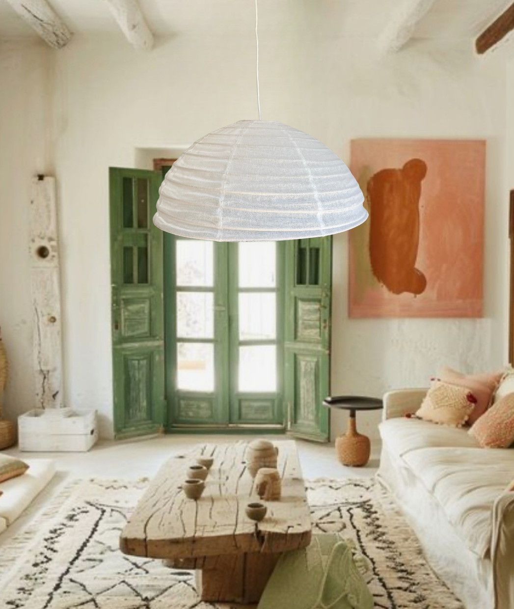 Living room with a white pendant lamp and colourful decor