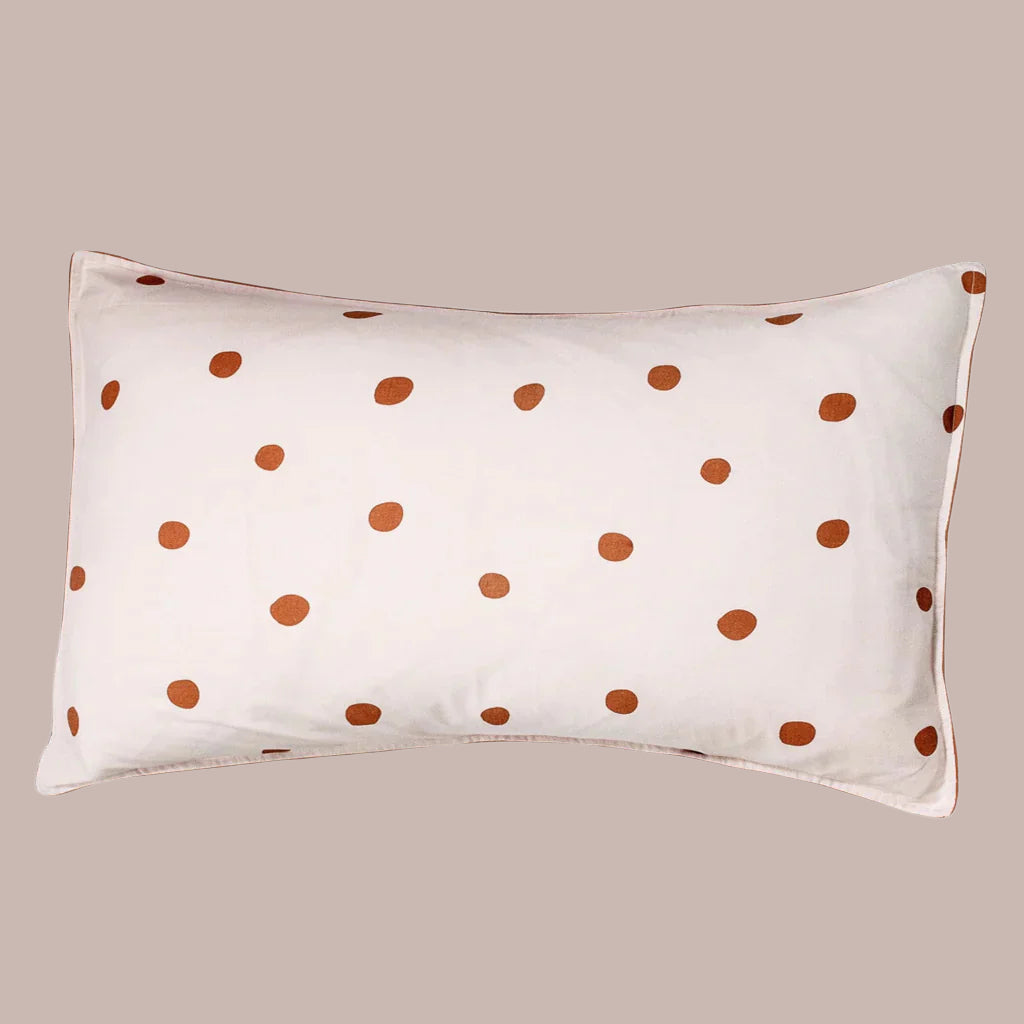 Polka dot print pillow case in Champagne Pink with Bran Terracotta. .