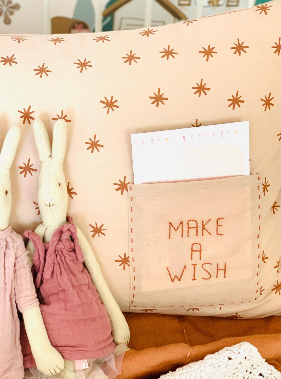 Children's room with a with 'Make a Wish' linen pillow-case.