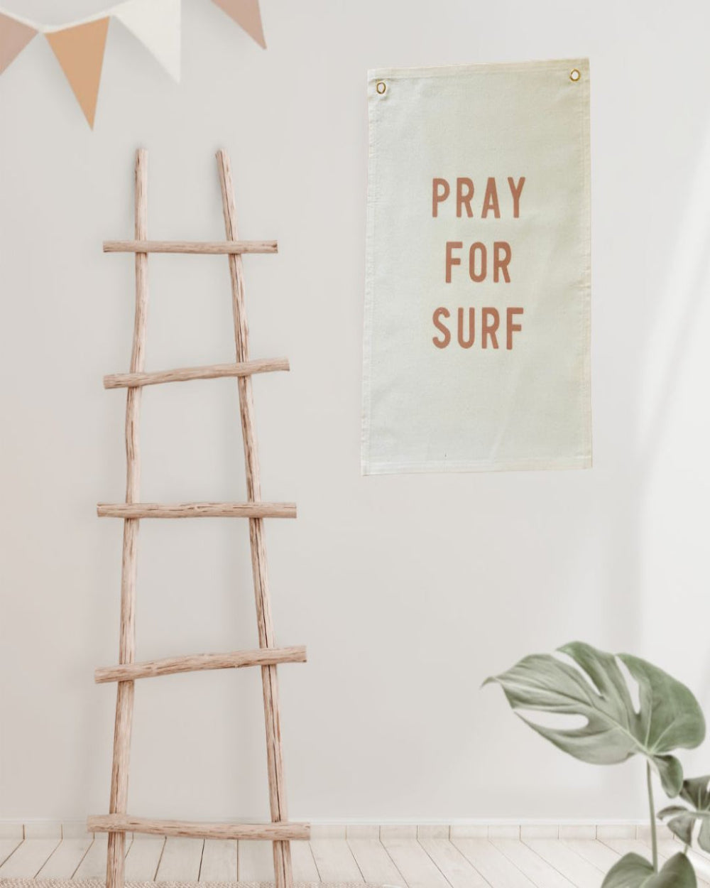 Canvas Pray for Surf Wall banner printed on natural canvas with eyelets for hanging.