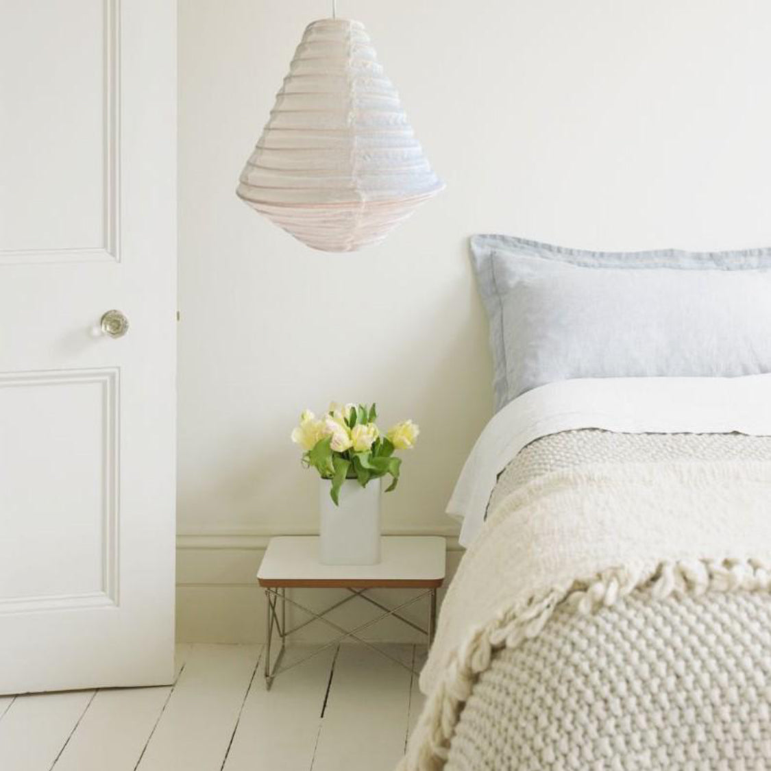 Linen pendant diamond-shaped light fixture.