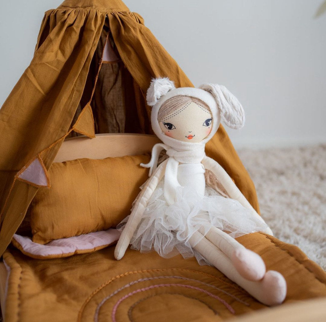 Rust coloured linen doll quilt and canopy