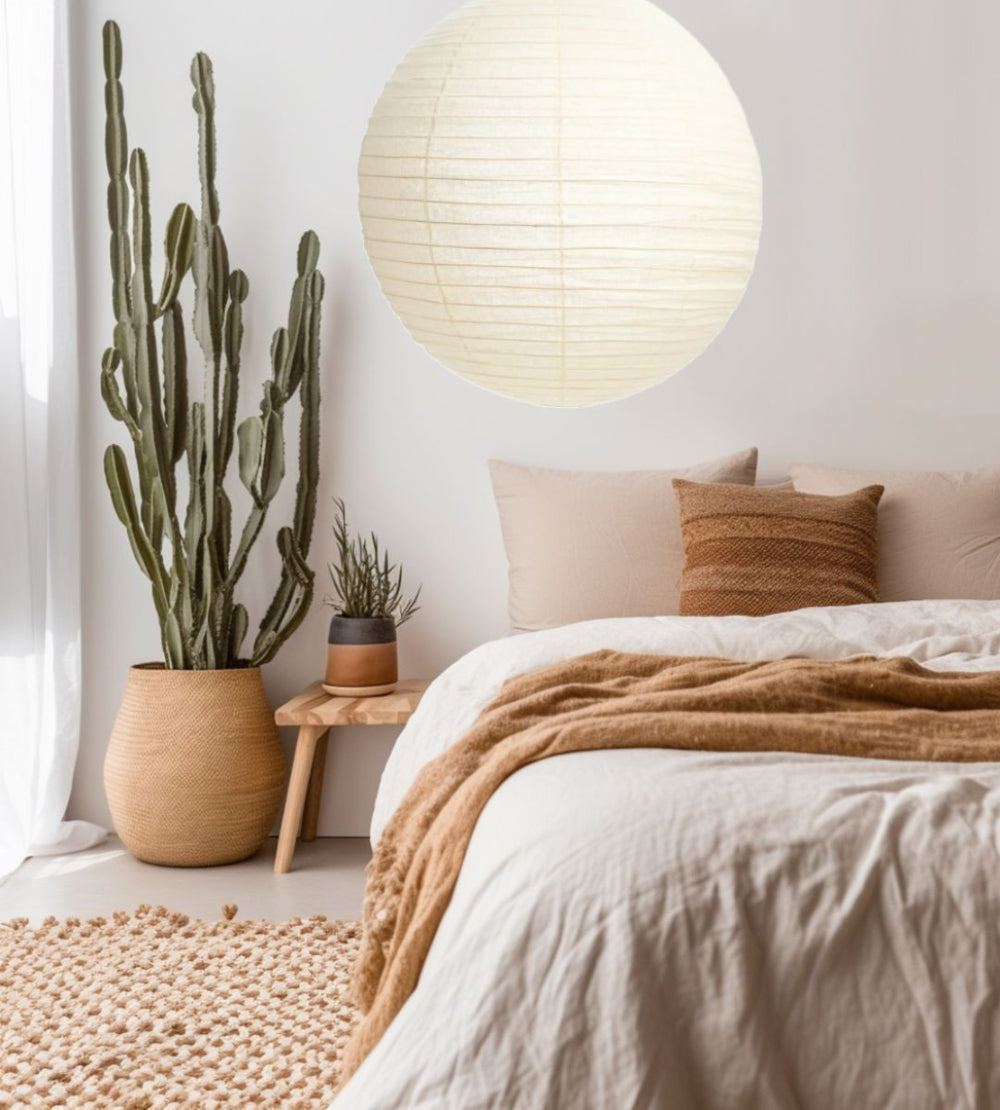 A linen light shade with a warm white glow, Scandinavian-inspired for coastal room design.