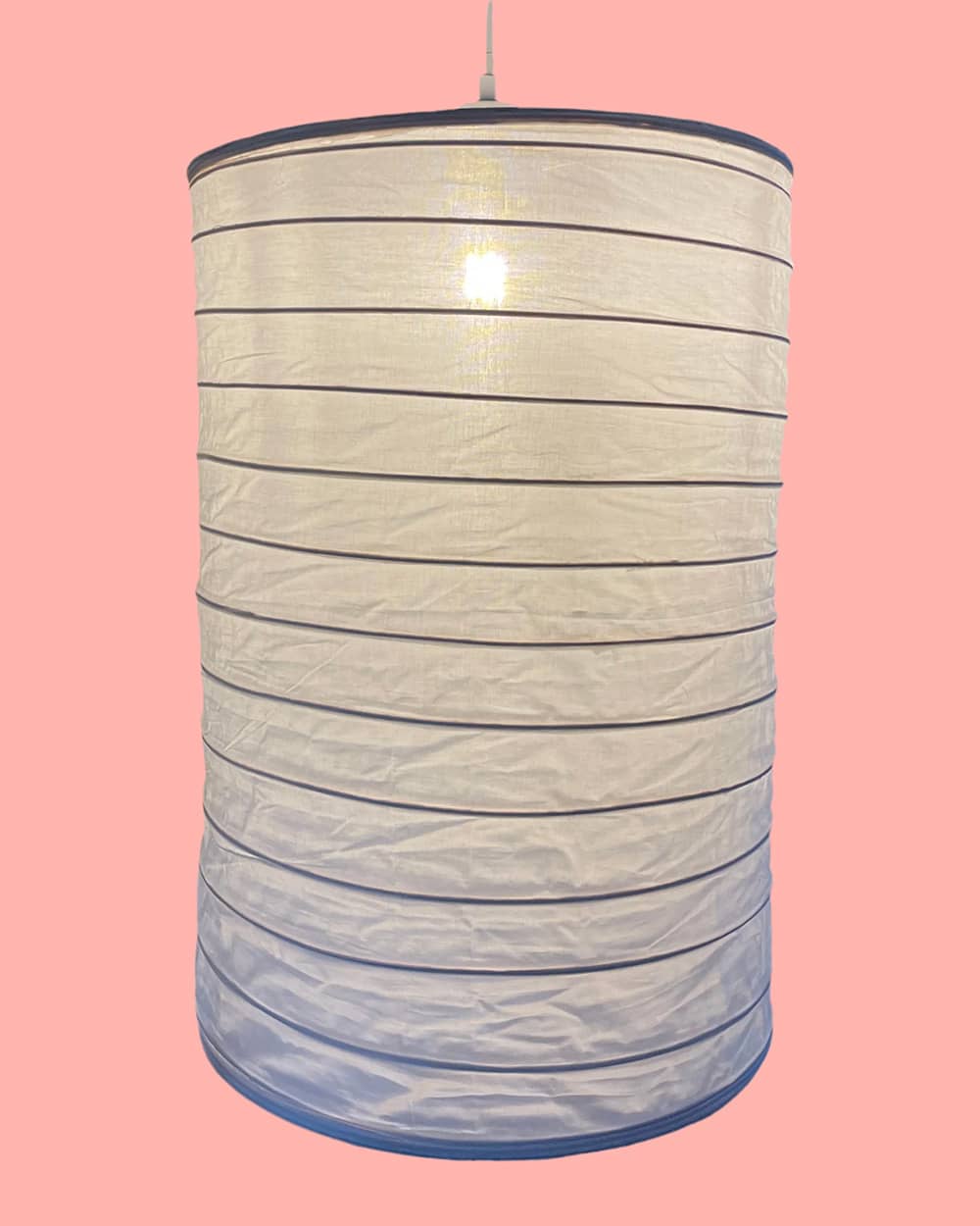 Flue-shaped 60cm lampshade on a pink background