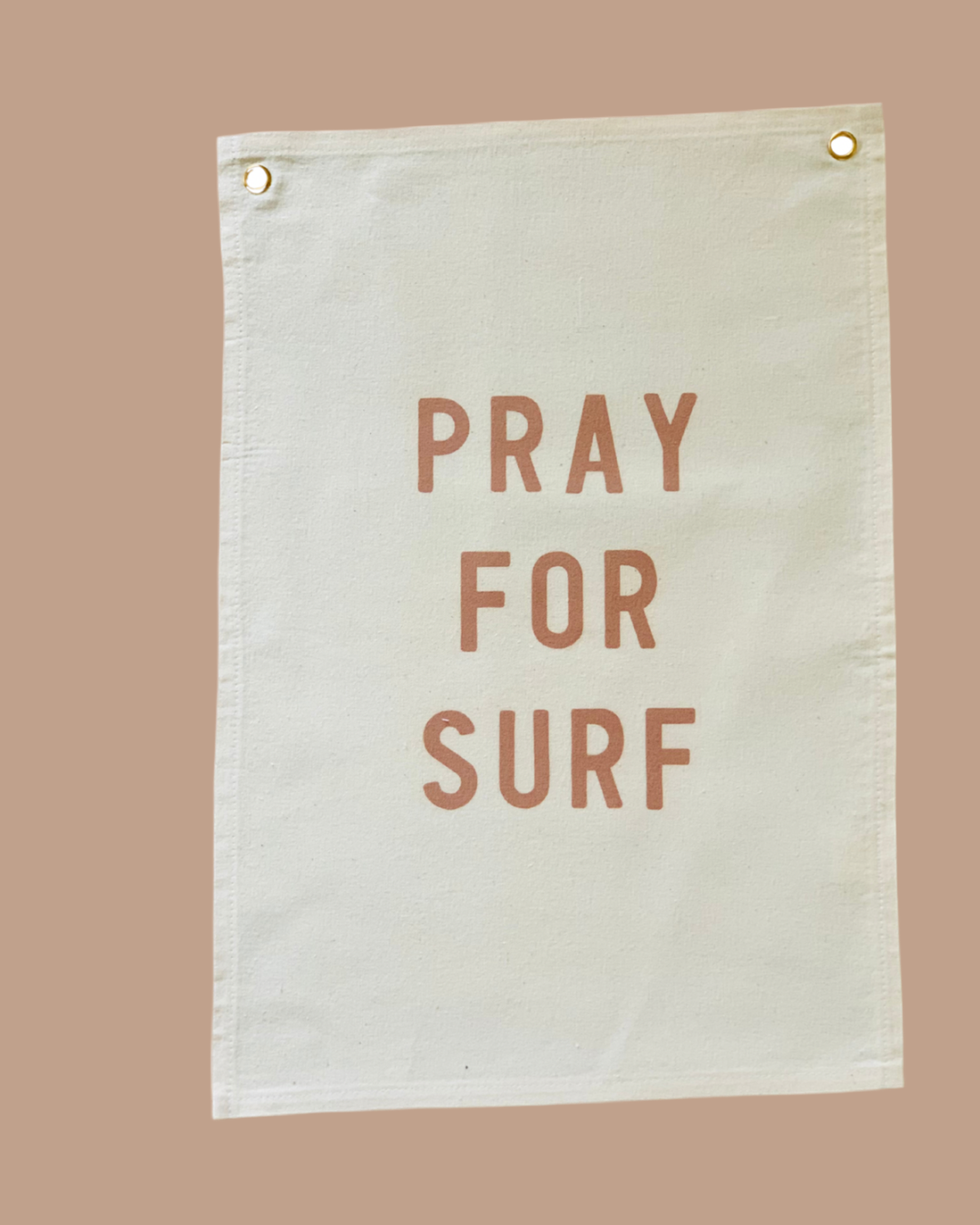 Canvas banner with 'PRAY FOR SURF' text on a beige background