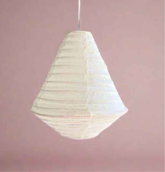 White pendant lamp against a pink background
